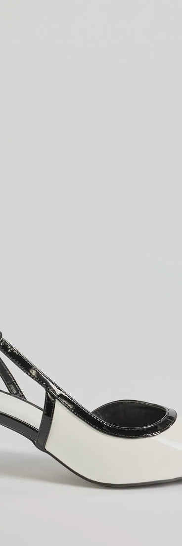 The Chic Icon Sling-Back Kitten Heel Pumps are women's black shoes for work, featuring a sleek silhouette and cushioned sole for all-day comfort, and are a trendy choice for professional or business casual outfits.