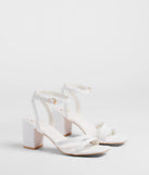 Stay on-trend this season with the Step Into Chic Strappy Block Heels in white, a must-have for creating stylish and effortless spring outfits for women.