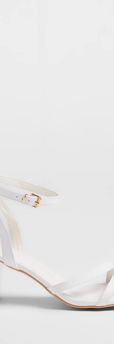 The Step Into Chic Strappy Block Heels in white brings sleek style to any graduation outfit, from cap and gown to after-party.