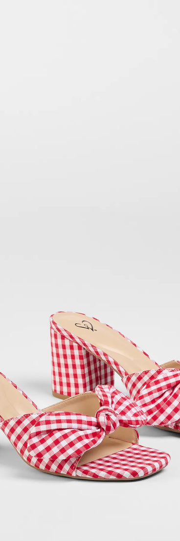 Step into style with the Cutesy Babe Gingham Bow Strap Mules, red heels made to complete your Windsor look with comfort and glam in mind.