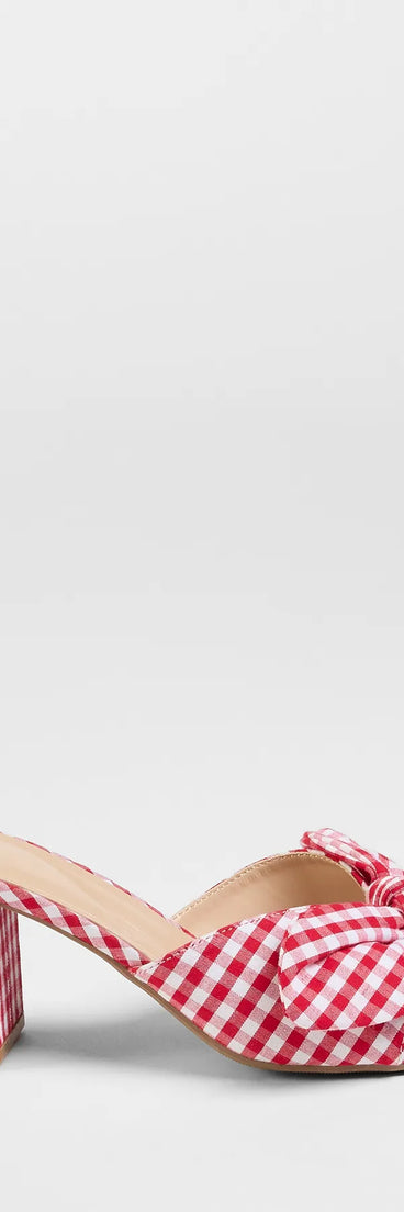 Turn heads in the Cutesy Babe Gingham Bow Strap Mules, red heels showcasing a fresh trend or stylish detail made to elevate your full Windsor fit.