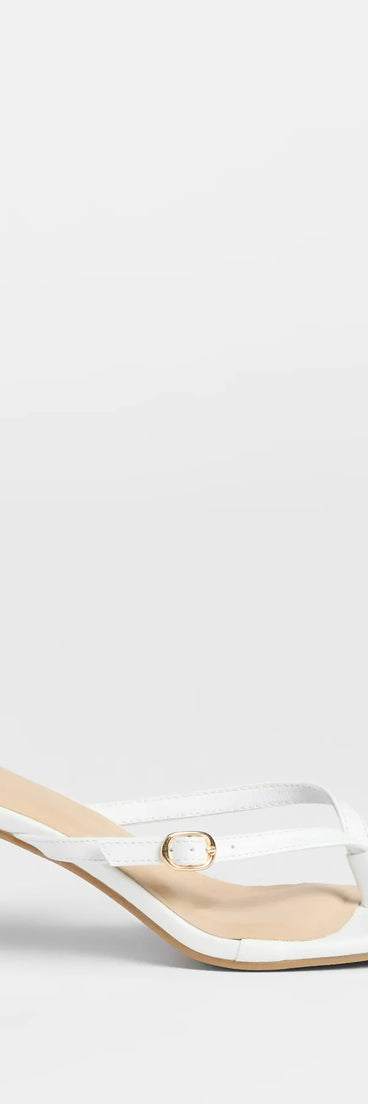 Turn heads in the The Best Choice Thong Buckle Mules, white heels showcasing a fresh trend or stylish detail made to elevate your full Windsor fit.