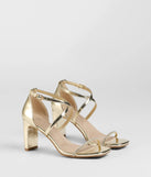 The Pure Magic Rhinestone Metallic Block Heels in gold brings sleek style to any graduation outfit, from cap and gown to after-party.