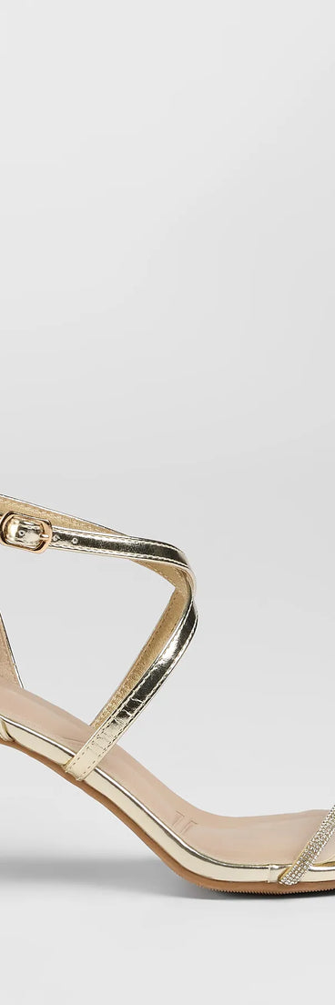 Elevate warm-weather looks with Pure Magic Rhinestone Metallic Block Heels in gold, a pair of trendy sandals bringing chic, modern flair to every step.