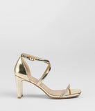 The Pure Magic Rhinestone Metallic Block Heels in gold brings sleek style to any graduation outfit, from cap and gown to after-party.