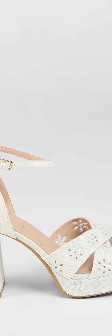Elevate warm-weather looks with Resort Ready Eyelet Linen Platform Block Heels in ivory, a pair of trendy sandals bringing chic, modern flair to every step.