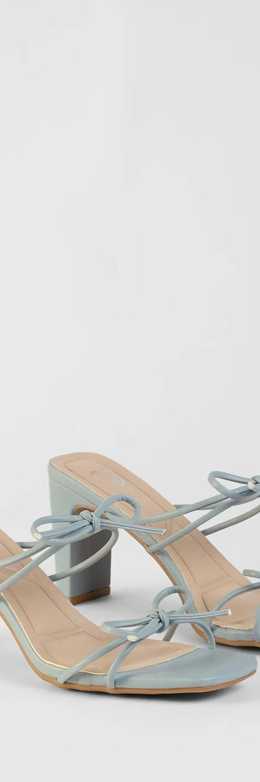 Step into style with the Finest Hour Bow Strappy Mules, blue heels made to complete your Windsor look with comfort and glam in mind.