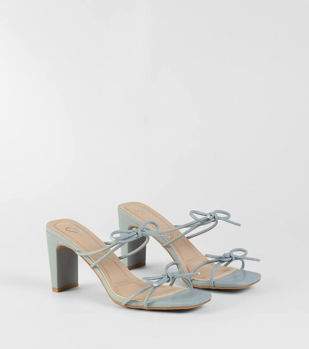 The Finest Hour Bow Strappy Mules in blue brings sleek style to any graduation outfit, from cap and gown to after-party.