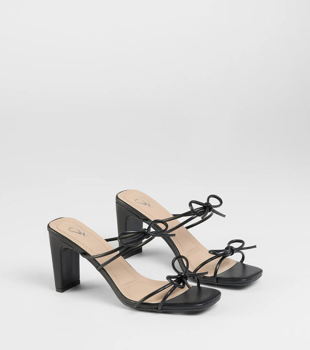 The Finest Hour Bow Strappy Mules in black brings sleek style to any graduation outfit, from cap and gown to after-party.