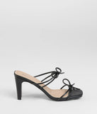 The Finest Hour Bow Strappy Mules in black brings sleek style to any graduation outfit, from cap and gown to after-party.