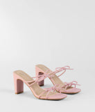 The Finest Hour Bow Strappy Mules in pink brings sleek style to any graduation outfit, from cap and gown to after-party.