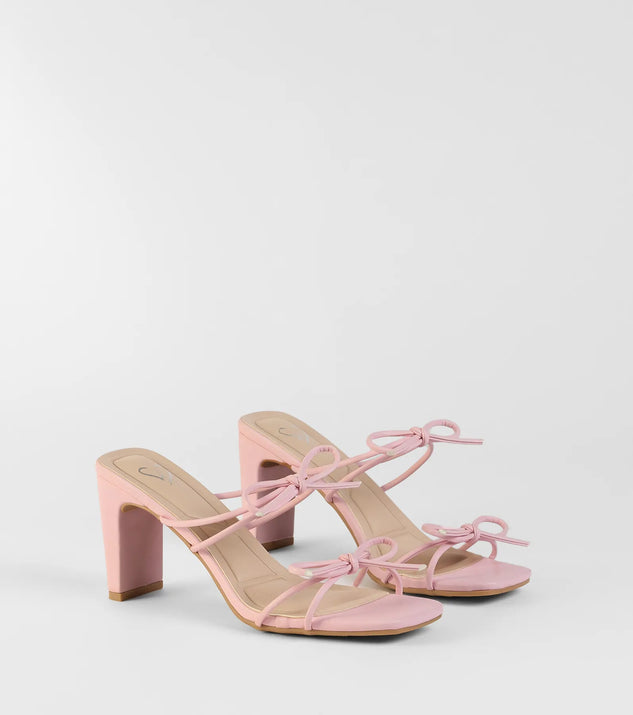 The Finest Hour Bow Strappy Mules in pink brings sleek style to any graduation outfit, from cap and gown to after-party.