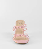 The Finest Hour Bow Strappy Mules in pink brings sleek style to any graduation outfit, from cap and gown to after-party.