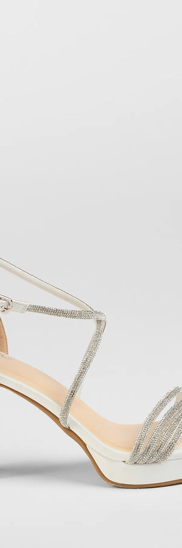 Elevate warm-weather looks with Night Shimmer Rhinestone Platform Block Heels in white, a pair of trendy sandals bringing chic, modern flair to every step.