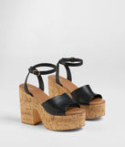 The Pop The Cork Platform Heels in black brings edge and energy to your vibe, ready to elevate any festival look or concert outfit.