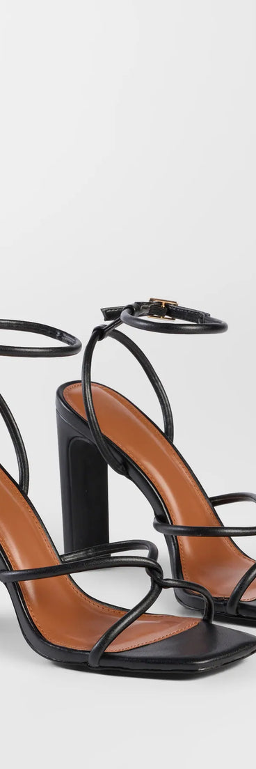 Step into style with the So Elegant Twist Strappy Block Heels, black heels made to complete your Windsor look with comfort and glam in mind.