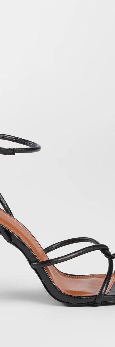 The So Elegant Twist Strappy Block Heels in black brings sleek style to any graduation outfit, from cap and gown to after-party.