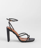The So Elegant Twist Strappy Block Heels in black brings sleek style to any graduation outfit, from cap and gown to after-party.