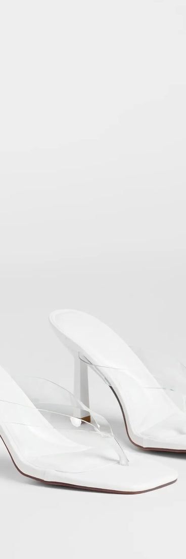 Step into style with the Sleek And Stunning Thong Stiletto Mules, white heels made to complete your Windsor look with comfort and glam in mind.