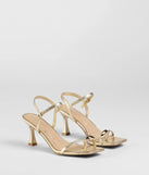 Step into style with the Fabulous Strut Strappy Kitten Heels, gold heels made to complete your Windsor look with comfort and glam in mind.