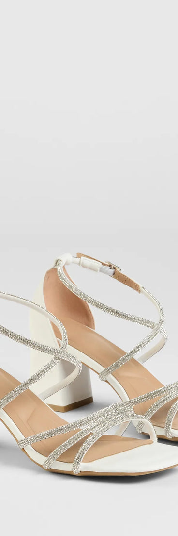 Step into style with the A-List Glam Rhinestone Strappy Block Heels, white heels made to complete your Windsor look with comfort and glam in mind.