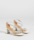 The A-List Glam Rhinestone Strappy Block Heels in white brings sleek style to any graduation outfit, from cap and gown to after-party.