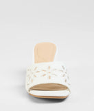 Turn heads in the Perfect Pair Cutout Block Heel Mules, white heels showcasing a fresh trend or stylish detail made to elevate your full Windsor fit.