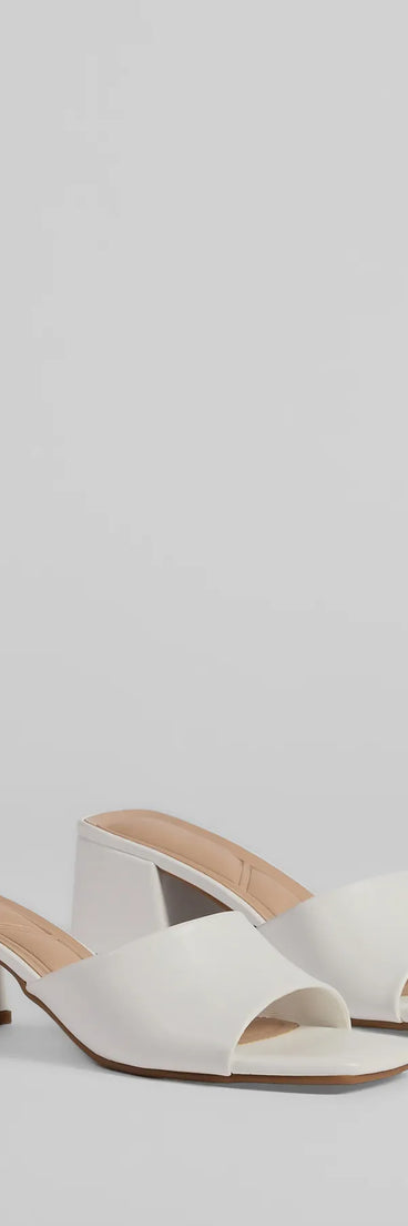 Style made simple with the Chic Upgrade Basic Block Heel Mules in white, trendy women’s shoes that take your outfit from basic to bold in one step.