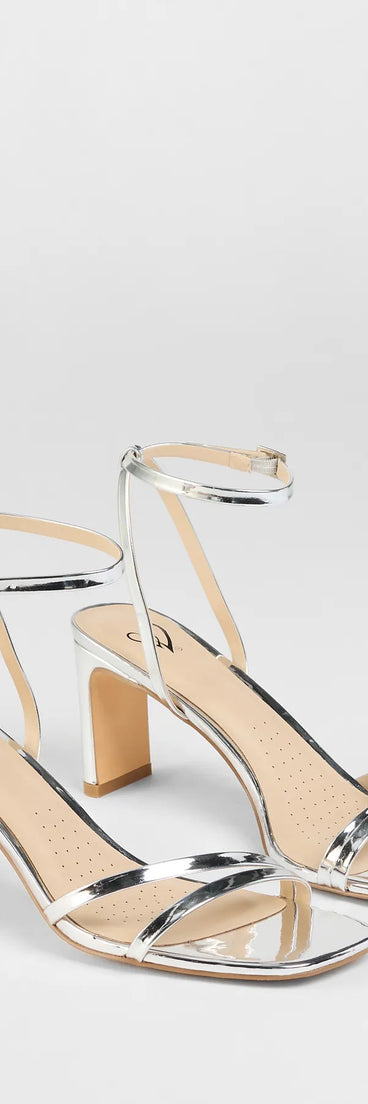 Step into style with the So Obsessed Metallic Strappy Block Heels, silver heels made to complete your Windsor look with comfort and glam in mind.