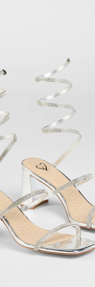 Step into style with the Sparkle And Shine Rhinestone Spiral Block Heels, silver heels made to complete your Windsor look with comfort and glam in mind.