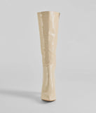 The Must-Have Under The Knee Croc Faux Leather Boots are women's ivory shoes for work, featuring a sleek silhouette and cushioned sole for all-day comfort, and are a trendy choice for professional or business casual outfits.