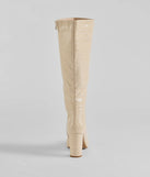 The Must-Have Under The Knee Croc Faux Leather Boots are women's ivory shoes for work, featuring a sleek silhouette and cushioned sole for all-day comfort, and are a trendy choice for professional or business casual outfits.