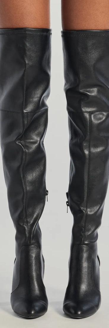 Sleek Look Thigh-High Block Heel Boots, a trendy black addition to women's going-out outfits, is ideal for Christmas party outfits, chic NYE attire, or winter night-out looks that keep you on-trend!