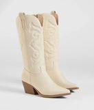 The Country Daze Under-The-Knee Cowboy Boots in ivory brings edge and energy to your vibe, ready to elevate any festival look or concert outfit.