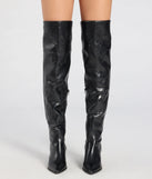 The Sleek Western Vibe Thigh High Cowboy Boots in black brings edge and energy to your vibe, ready to elevate any festival look or concert outfit.