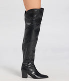 The Sleek Western Vibe Thigh High Cowboy Boots in black brings edge and energy to your vibe, ready to elevate any festival look or concert outfit.
