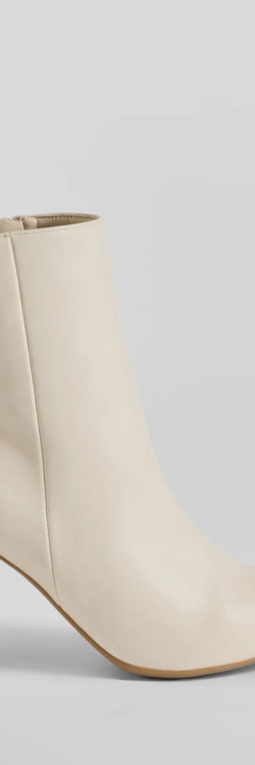 Made For Struttin' Basic Faux Leather Booties, a trendy ivory addition to women's going-out outfits, is ideal for Christmas party outfits, chic NYE attire, or winter night-out looks that keep you on-trend!