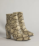 So Fierce Faux Leather Snake Print Ankle Booties, a trendy snake print addition to women's going-out outfits, is ideal for Christmas party outfits, chic NYE attire, or winter night-out looks that keep you on-trend!