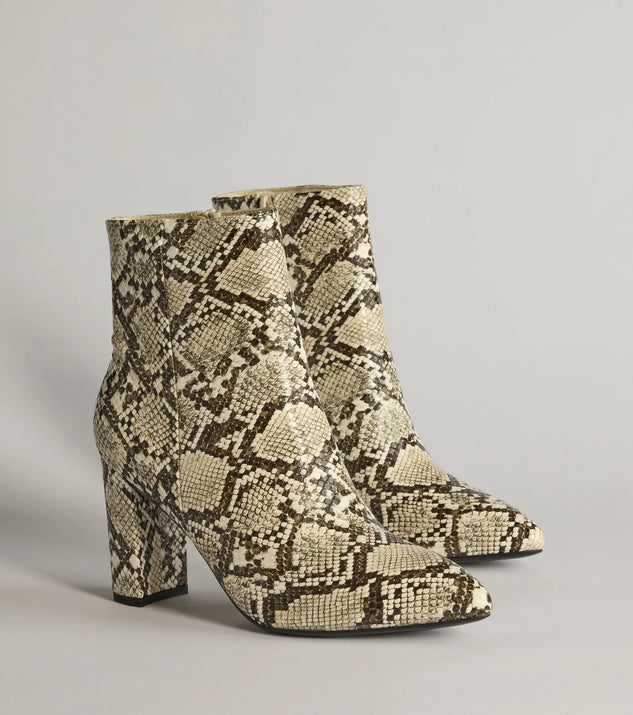 So Fierce Faux Leather Snake Print Ankle Booties, a trendy snake print addition to women's going-out outfits, is ideal for Christmas party outfits, chic NYE attire, or winter night-out looks that keep you on-trend!