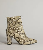 So Fierce Faux Leather Snake Print Ankle Booties, a trendy snake print addition to women's going-out outfits, is ideal for Christmas party outfits, chic NYE attire, or winter night-out looks that keep you on-trend!