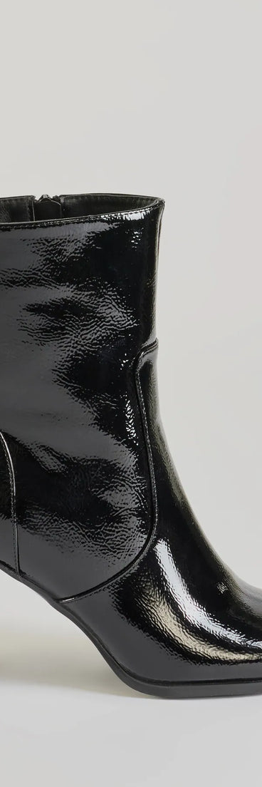 
Upgrade your style game for 2025 with the Bold Baddie Faux Patent Leather Ankle Booties in black, perfect for any fashion-forward wardrobe.