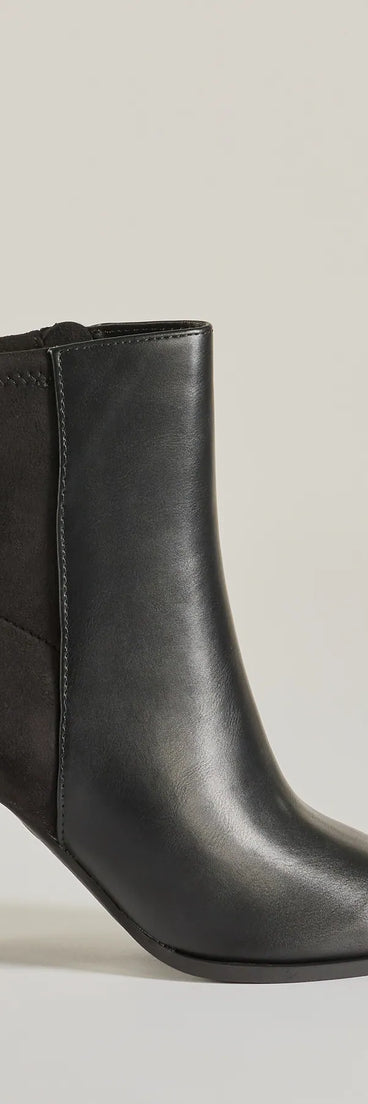 Chic Staple Faux Leather and Faux Suede Ankle Booties, a trendy black addition to women's going-out outfits, is ideal for Christmas party outfits, chic NYE attire, or winter night-out looks that keep you on-trend!