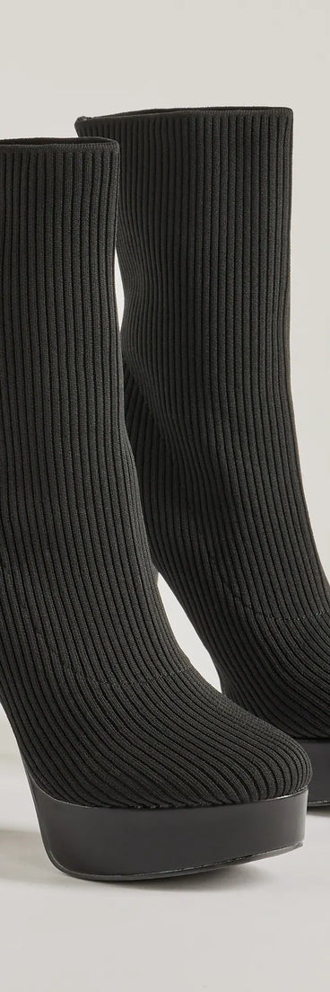 The Feeling Knit Platform Ankle Booties are women's black shoes for work, featuring a sleek silhouette and cushioned sole for all-day comfort, and are a trendy choice for professional or business casual outfits.