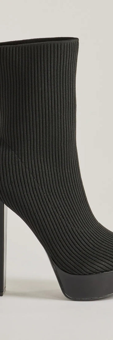The Feeling Knit Platform Ankle Booties are women's black shoes for work, featuring a sleek silhouette and cushioned sole for all-day comfort, and are a trendy choice for professional or business casual outfits.