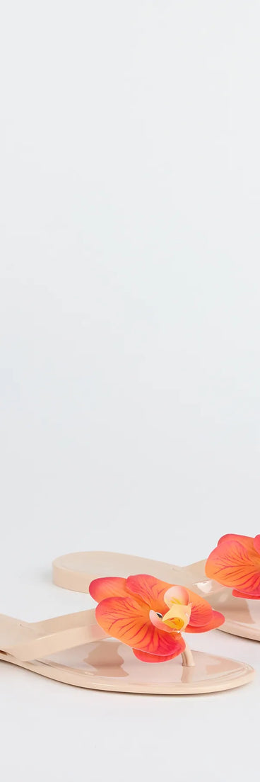 Elevate warm-weather looks with On Vacay Flower Strap Jelly Sandals in nude, a pair of trendy sandals bringing chic, modern flair to every step.