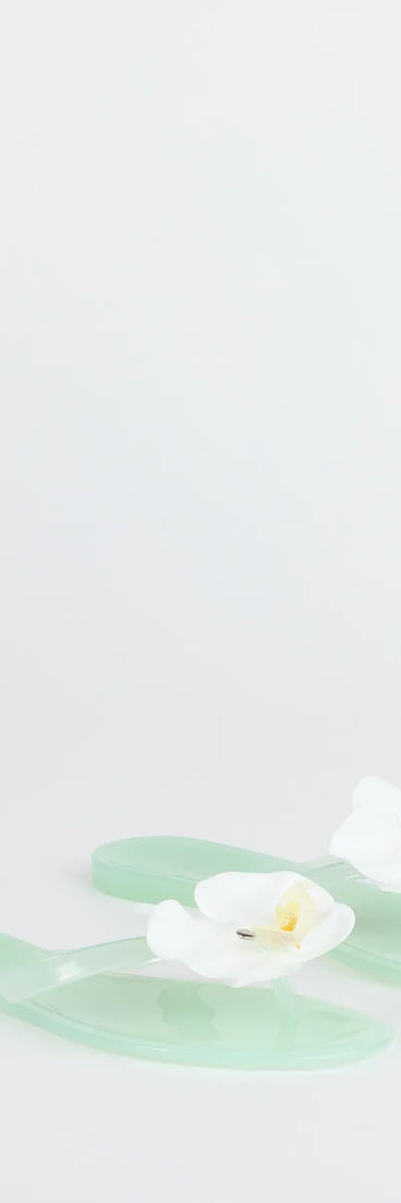 Elevate warm-weather looks with On Vacay Flower Strap Jelly Sandals in mint green, a pair of trendy sandals bringing chic, modern flair to every step.