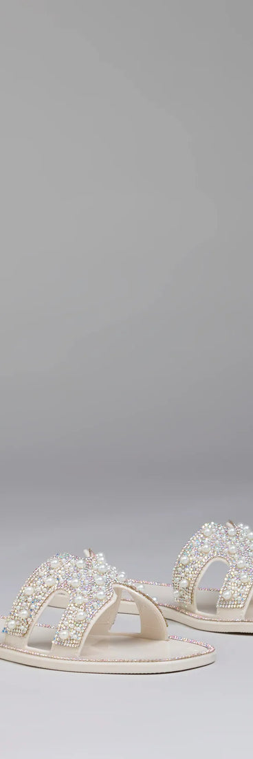 Elevate warm-weather looks with Pop Of Luxe Sparkle Faux Pearl Rhinestone Sandals in ivory, a pair of trendy sandals bringing chic, modern flair to every step.