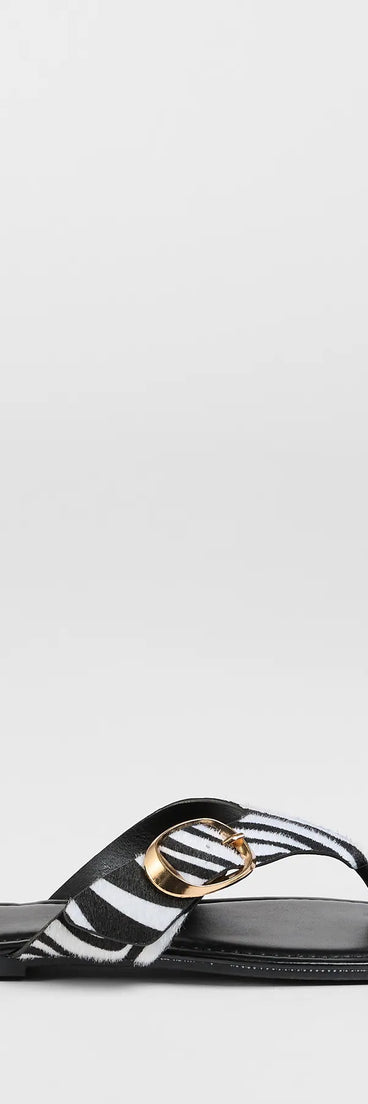 Get inspired with the Statement Gleam Buckle Thong Sandals, a feed-worthy zebra print piece that’s part of Windsor's updated and curated women’s clothing edit packed with must-have fall outfit ideas.