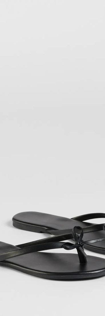 Style made simple with the Perfect Pair Bow Detail Thong Strap Sandals in black, trendy women’s shoes that take your outfit from basic to bold in one step.