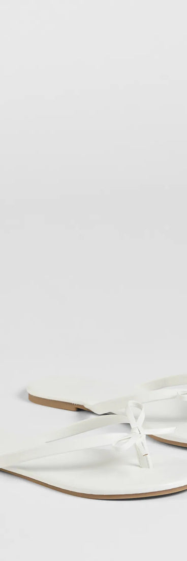 Stay on-trend this season with the Perfect Pair Bow Detail Thong Strap Sandals in white, a must-have for creating stylish and effortless fall outfits for women.